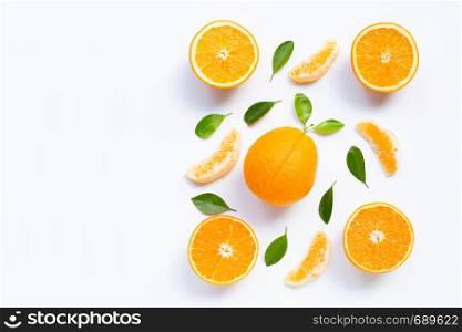 High vitamin C. Fresh orange citrus fruit with leaves isolated on white background. Copy space