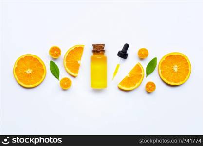 High vitamin C. Fresh orange fruit with leaves. Natural citrus oil isolated on white background.