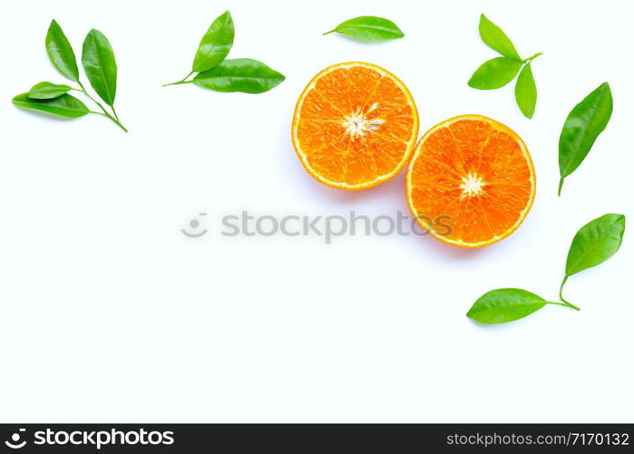 High vitamin C, Juicy orange fruit with leaves on white background. Copy space