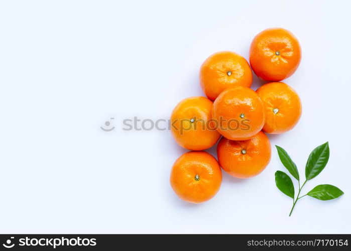 High vitamin C, Juicy orange fruit with leaves on white background. Copy space