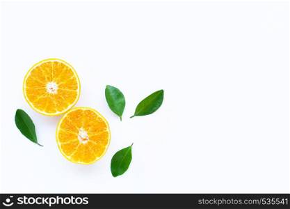 High vitamin C, Orange fruits with leaves on white background. Top view