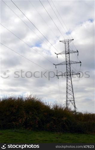 high voltage electricity pylon in the countryside Gaumaise