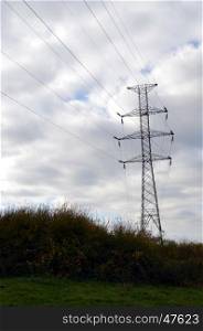 high voltage electricity pylon in the countryside Gaumaise