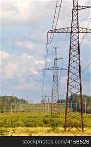 High-voltage line of electricity transmissions on field