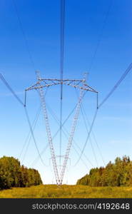 High-voltage line of electricity transmissions on field