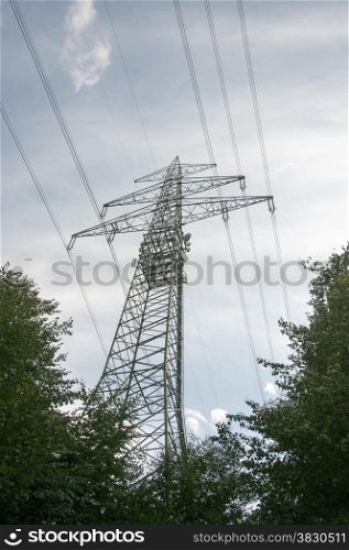 high voltage power electricity pylons under sky