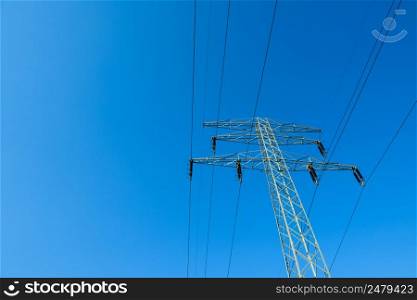 High voltage power lines on pylon