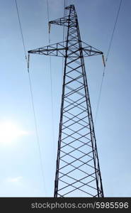 High voltage power pylons against blue sky. High voltage power pylons against blue sky.