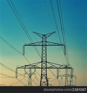High voltage pylons. Concept for technology and industry. Rising energy prices - further rising electricity and energy prices - the energy crisis caused by the war between Russia and Ukraine.