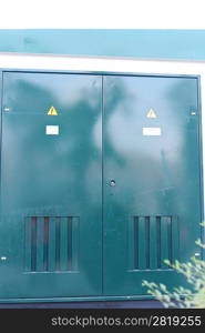 high voltage sign on the door outdoors