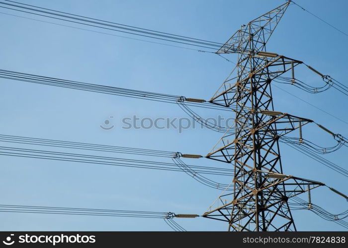 High voltage towers. High voltage power electric transmission towers of a power plant to the substation.