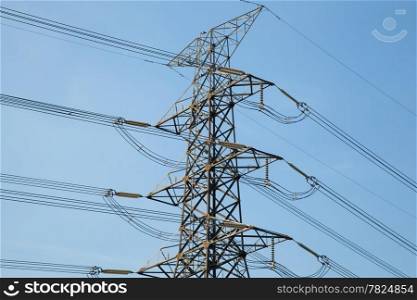 High voltage towers. High voltage power electric transmission towers of a power plant to the substation.