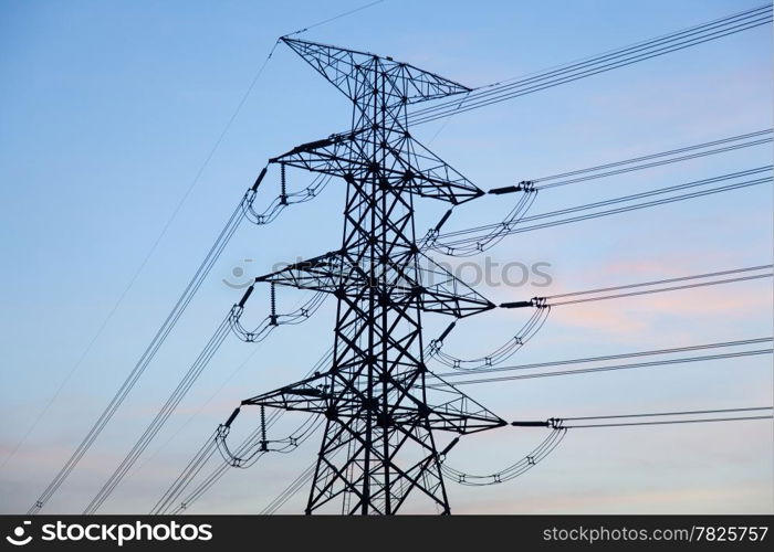 High voltage towers. High voltage power electric transmission towers of a power plant to the substation.