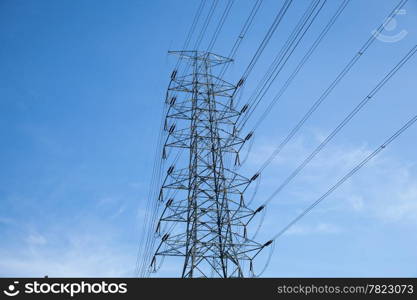 High voltage towers. The meadow below. Industry and nature coexist in appropriate Slightly cloudy sky.And sailed through the air.