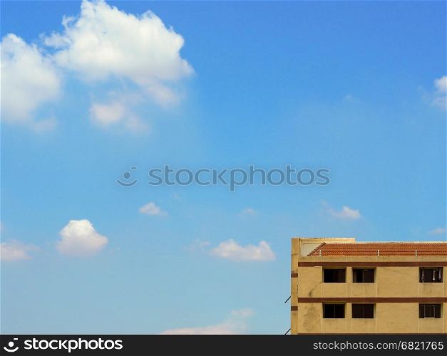 Highest floor of old apartment building with cloud and sky space for text