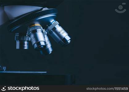Hight technology microscope at science laboratory for technician using in a histological sample education, a biopsy in the laboratory of research