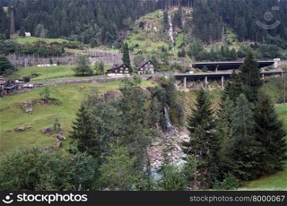 Highway and river in mountain area of Switzerland
