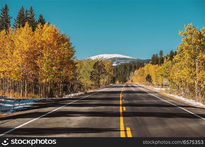 Highway at autumn sunny day in Colorado, USA. 