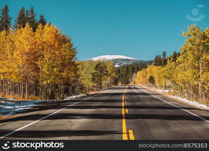 Highway at autumn sunny day in Colorado, USA. 