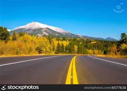 Highway at autumn sunny day in Colorado, USA.