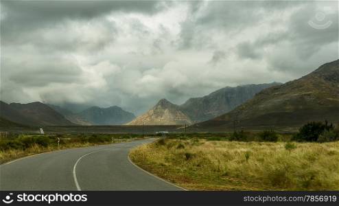 Highway cutting through the picturesque landscapes of the Western Cape regions of South Africa