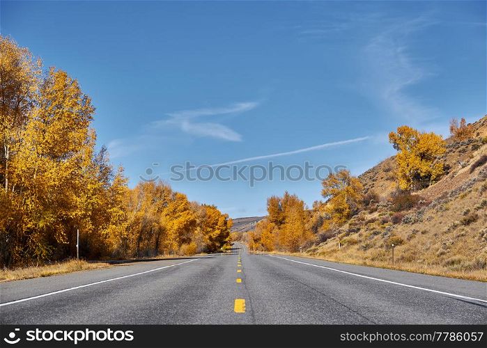 Highway in Colorado at autumn, USA.