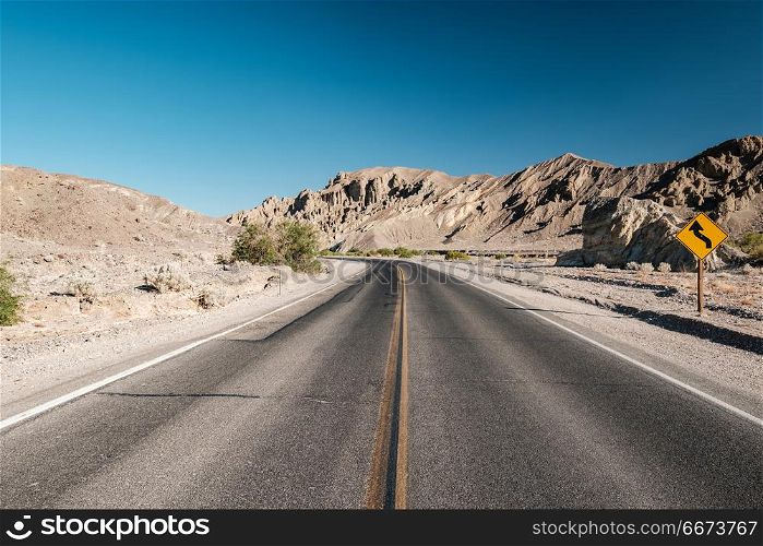 Highway in Death Valley National Park, California. Open highway in Death Valley National Park, California, USA.