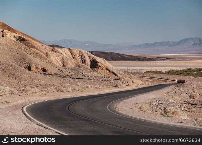 Highway in Death Valley National Park, California. Open highway in Death Valley National Park, California, USA.