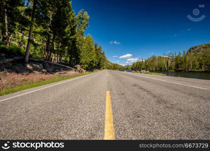 Highway in Yellowstone National Park. Highway in Yellowstone National Park, Wyoming, USA