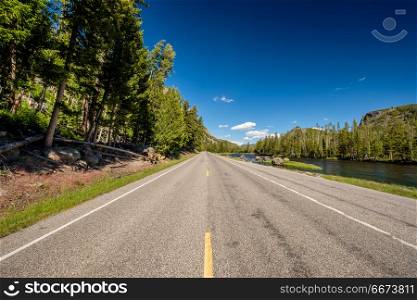Highway in Yellowstone National Park. Highway in Yellowstone National Park, Wyoming, USA