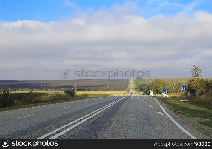 Highway landscape with moving cars at daytime