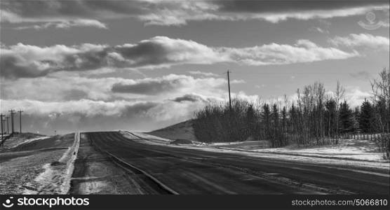 Highway passing through landscape, Redwood Meadows, Cowboy Trail, Priddis, Alberta, Canada