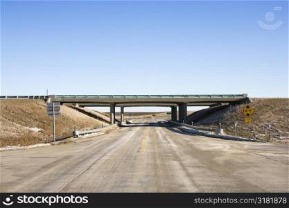 Highway with overpass bridge.