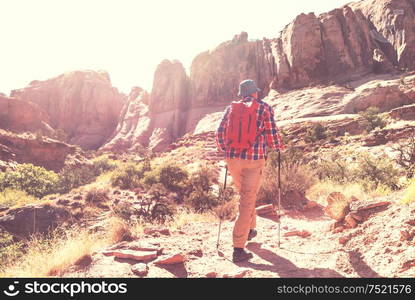 Hike in the Utah mountains. Hiking in unusual natural landscapes. Fantastic forms sandstone formations.