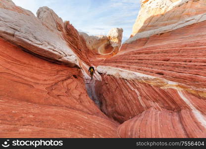 Hike in the Utah mountains. Hiking in unusual natural landscapes. Fantastic forms sandstone formations.