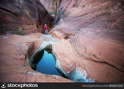 Hike in the Utah mountains. Hiking in unusual natural landscapes. Fantastic forms sandstone formations.