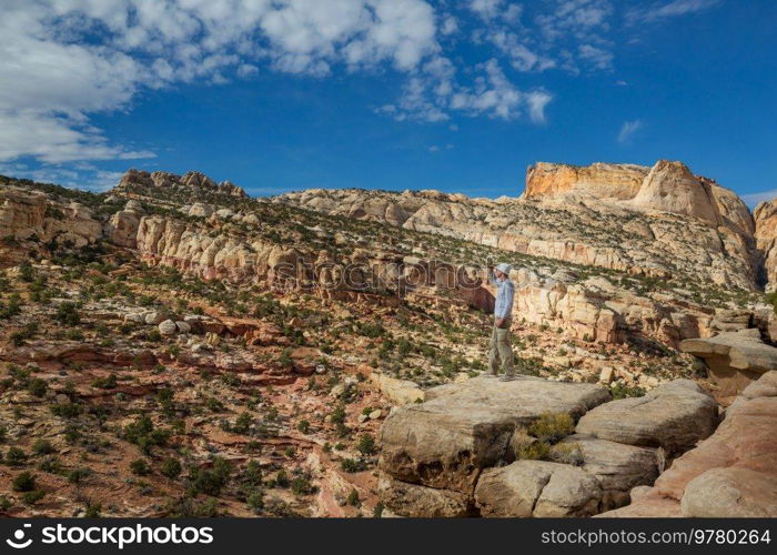 Hike in the Utah mountains. Hiking in unusual natural landscapes. Fantastic forms sandstone formations.