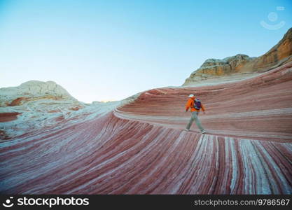 Hike in the Utah mountains. Hiking in unusual natural landscapes. Fantastic forms sandstone formations.