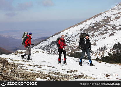 Hike in winter mountains