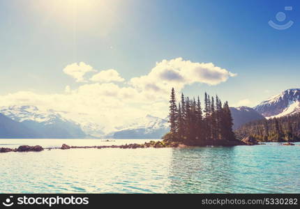 Hike to turquoise waters of picturesque Garibaldi Lake near Whistler, BC, Canada. Very popular hike destination in British Columbia.