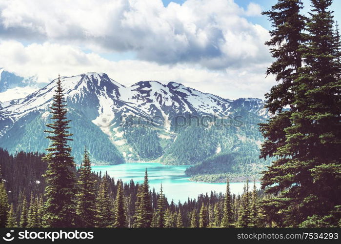 Hike to turquoise waters of picturesque Garibaldi Lake near Whistler, BC, Canada. Very popular hike destination in British Columbia.