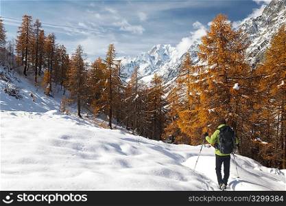 Hiker in a winter mountain landscape, Mont Blanc, Italy