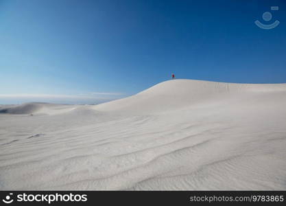 Hiker in White Sands Dunes in New Mexico, USA