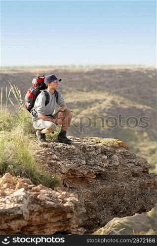 Hiker on Top of Mountain Range