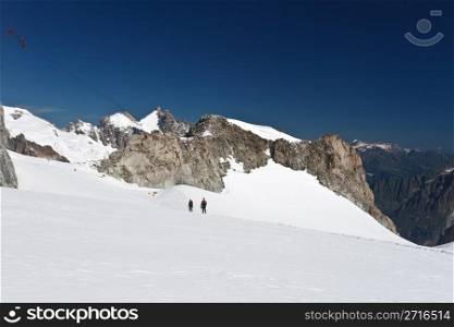 hikers on Mer de Glace glacier, Mont Blanc massif