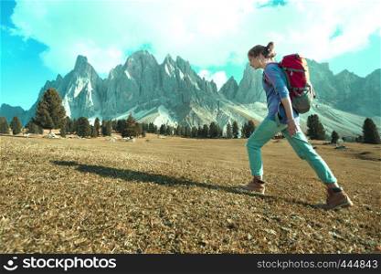 hiking boots close-up. tourist girl walking at the Puez Odle. Italy