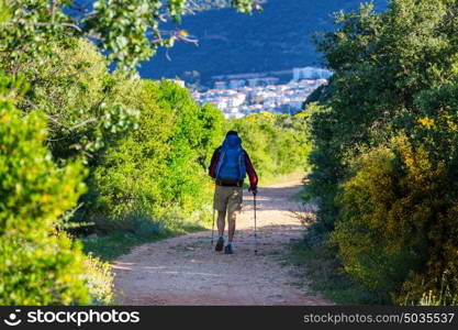 Hiking in famous Lycian Way in the Turkey. Backpacker in the trail.