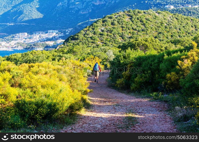 Hiking in famous Lycian Way in the Turkey. Backpacker in the trail.