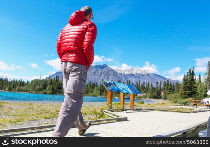 Hiking man in Canadian mountains. Hike is the popular recreation activity in North America. There are a lot of picturesque trails.