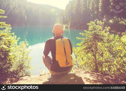 Hiking man in the mountains